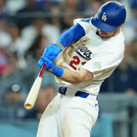 Tucker getting into groove as Dodgers win opener
