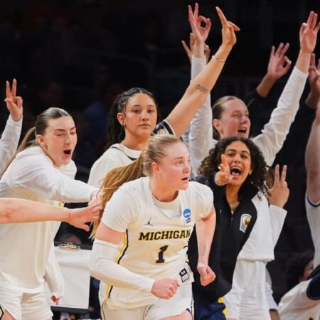 Olson leads Michigan past Louisville into Elite 8