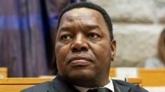 South Africa’s president suspends police chief after court charges