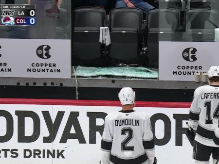 Glass shatters behind Kings bench, delays game