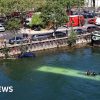 Trainee driver crashes bus into River Seine