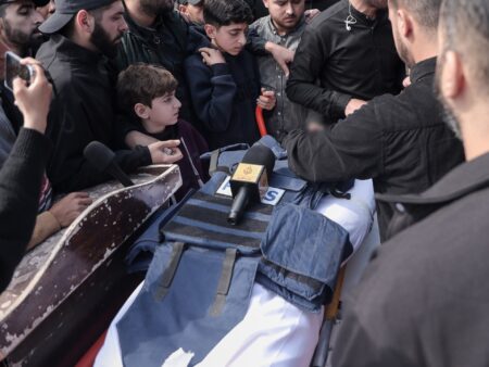 Al Jazeera’s Mohammed Wishah, killed by Israeli strike, laid to rest