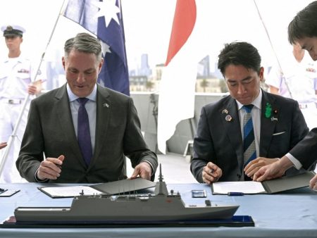 Australia and Japan sign contracts for $7bn warships deal