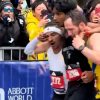 Runners help collapsed competitor at Boston Marathon