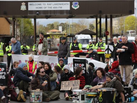 UK police arrest seven protesters near RAF base used by US