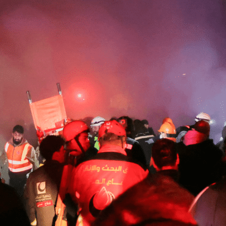 Emergency workers search for victims of Israeli airstrikes on Beirut