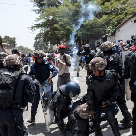 Gambia police fire tear gas at rally over rearrest of siblings