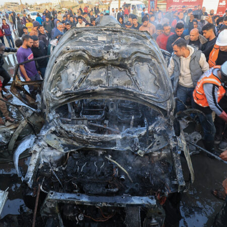 Vehicle engulfed in flames after Israeli drone strike in central Gaza