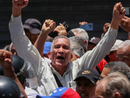 Riot police push back protesters demanding higher wages in Venezuela