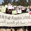 Palestinian children protest against siege on their school