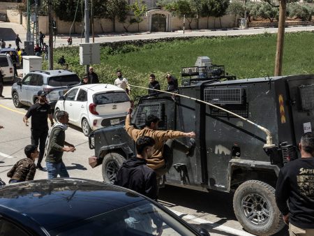 Israeli forces fire tear gas at funeral of Palestinians killed by settlers