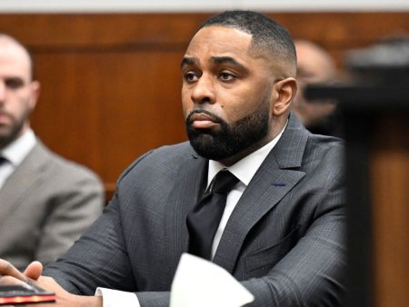 Ex-Michigan coach Moore avoids jail in sentencing