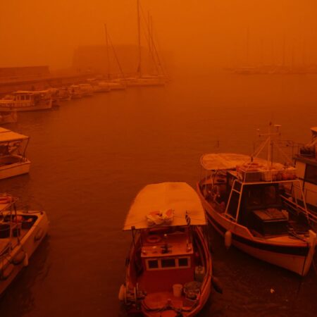 Holiday island is cloaked by Saharan dust storm – turning its blue skies blood red