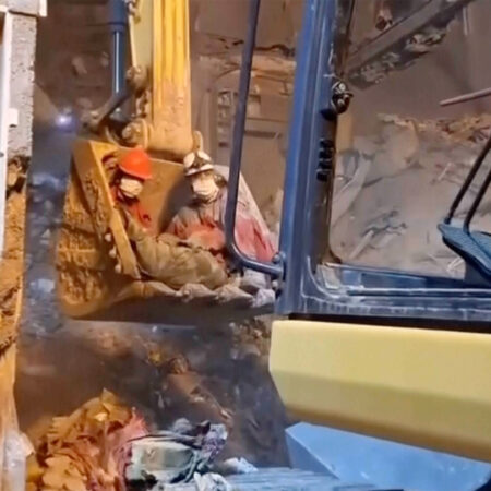 Rescuers search for survivors after strikes hit homes in Iran