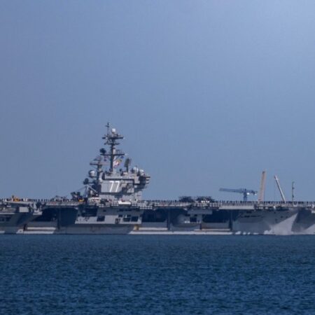 Thousands more US troops headed to Middle East aboard aircraft carrier