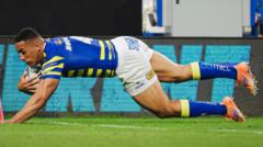 Warrington sweep aside Huddersfield to go third