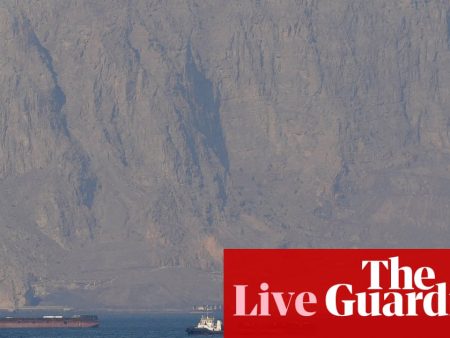 Middle East crisis live: tanker hit by ‘projectiles’ in strait of Hormuz after Trump says US will help ‘guide’ stranded ships