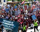 Thousands in US join ‘no school, no work, no shopping’ May Day protest and economic blackout
