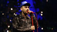 Zayn Malik cancels US tour and cuts UK dates after hospital bed photo shared