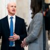 Coinbase laying off hundreds of employees, citing AI advancements