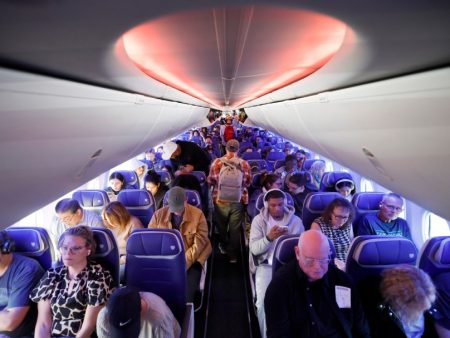 The reason you may be forced to take a middle seat on the plane – even when there are empty rows