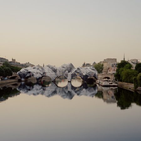 JR Conjures a Mountainous Illusion Out of the Pont Neuf in Paris