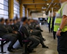 Staff at immigration detention centre wore England flags, report finds