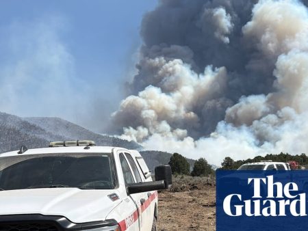 Utah wildfire forces evacuation of small town as extreme heat roasts US west