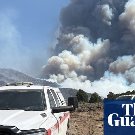 Utah wildfire forces evacuation of small town as extreme heat roasts US west