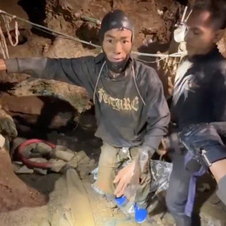Rescuers stop search for last two men lost in Laos cave