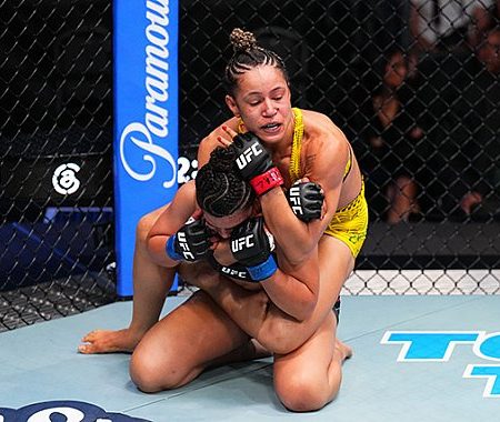 Former ring girl surprised with scorecards in UFC debut
