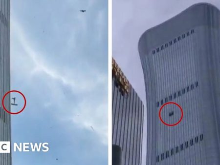 Debris falls after plane hits Beijing’s tallest building