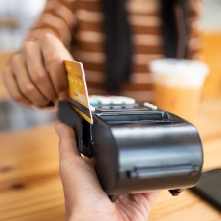 Sick of credit card swipe fees? Blame businesses, not the banks.