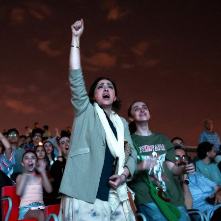 Iranians gather in Tehran to support team in critical draw against Belgium
