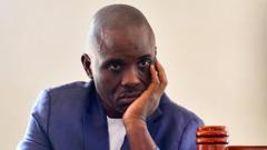 Lawyer of Uganda opposition figure Besigye charged with treason-related offence