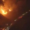 Watch: California wildfires rage near passing vehicles
