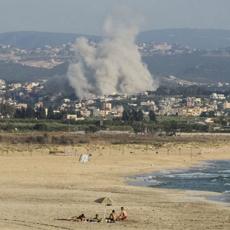 Israel continues strikes on Lebanon despite halting attacks on Iran