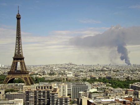 Thick black smoke towers over Paris skyline after warehouse blaze